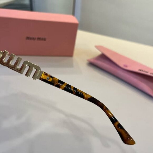 Miu Miu sunglasses, with glasses case. main image 3